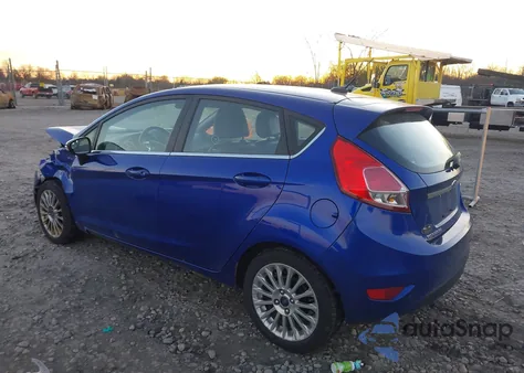 2014 Ford Fiesta Titanium из США, поврежденный, VIN 3FADP4FJ0EM148017